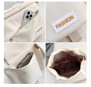 Detailansicht der beigen Nylontasche mit vielen Fächern und großem Innenraum