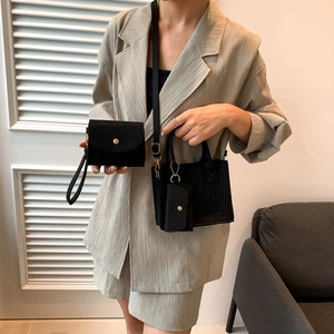 Three-piece black solid color felt bag set featuring a crossbody bag and shoulder tote
