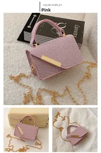 Detail view of pink tweed mini bag with gold hardware and chain strap accents