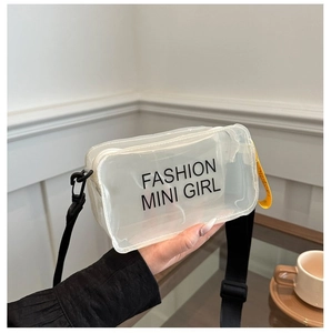 Close-up of transparent PVC crossbody bag with Fashion Mini Girl text and black strap