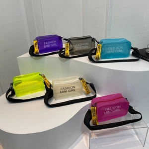 Transparent PVC jelly crossbody bags in six vibrant candy colors with wide straps