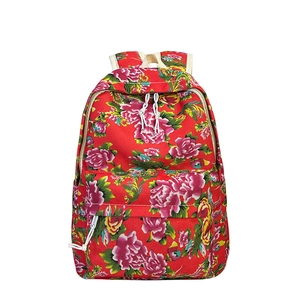 Red floral canvas backpack featuring traditional Chinese peony and phoenix patterns