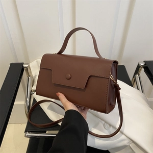 Classic brown leather small square handbag with adjustable strap for commuting