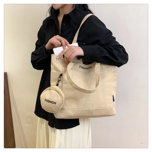 Beige canvas tote bag set with small round coin purse and FASHION text detail