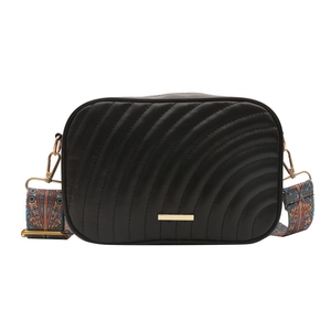 Minimalist black quilted crossbody bag with stylish ethnic pattern wide shoulder strap