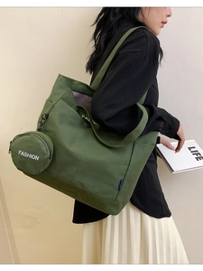 Large Capacity Canvas Tote Bag For Women Minimalist Commuter Shoulder Bag With Letter Print And Round Purse Pendant