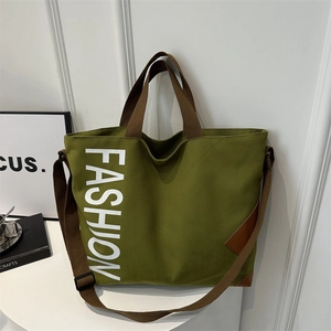 Grand sac cabas en toile verte avec lettrage blanc fashion et bandoulière réglable