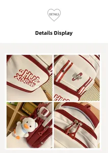 Detailed views of student backpack with retro logo print and cute duck plush charm accessory