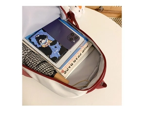 Interior view showing large capacity for tablet, books, and umbrella in the backpack