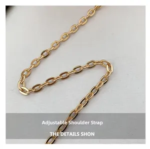 Close-up of a premium gold chain strap with adjustable length for women's evening bags