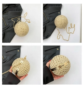 Macro detail of sphere evening bag showing woven texture, sequins and gold chain
