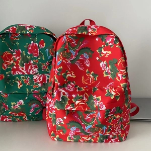 Ethnic style floral backpack with vibrant peony patterns and large travel capacity