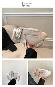 Détail du sac ceinture blanc crème avec bandoulière jacquard et zips à pompons
