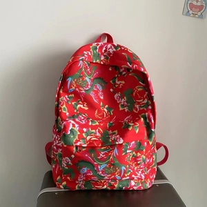 Ethnic style floral backpack with traditional red flower and dragon pattern for travel