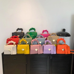 Quilted faux leather handbag set with ruffled handle and heart lock in 12 vibrant colors
