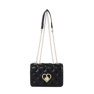 Black quilted shoulder bag with gold heart clasp and metal chain strap for women