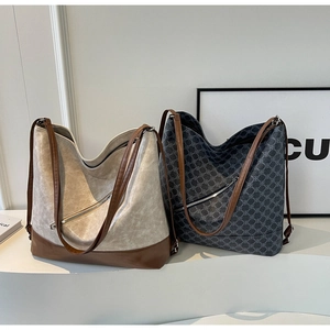 Detail of multi-functional dual-use tote bags in beige leather and grey geometric pattern