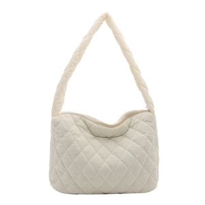 Quilted corduroy tote bag in cream white with braided shoulder strap and zipper closure