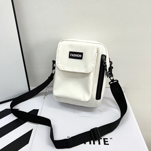 Minimalist white nylon crossbody phone bag with black fashion label and chain strap