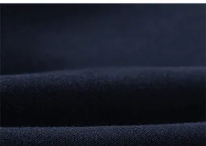 Close-up of soft navy blue knit fabric texture on comfortable toddler girl casual trousers