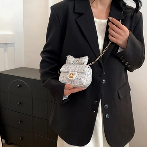 Mini checkered tweed crossbody bag for women with gold chain strap and bow decoration