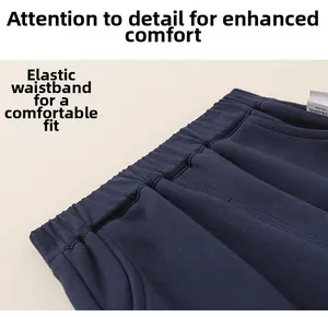 Detailed macro view of navy blue cotton kids pants with elastic waistband and size tag
