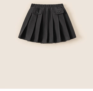 Detail of girls black pleated skirt with elastic high waist and two buttoned pockets