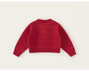 Detailed back view of a red knitted girls sweater with ribbed cuffs and hem detail