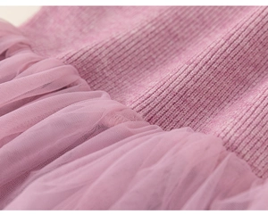Close-up of pink knitted ribbed fabric and multi-layer tulle mesh for girls' dress
