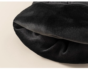 Detailed view of the soft black velvet inner lining on children's winter pleated skirt