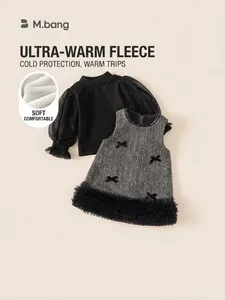 Winter girls' two-piece set featuring mesh sleeve top and tweed dress with bow accents