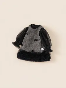 Elegant girls' two-piece tweed dress with black mesh sleeves and velvet bow details