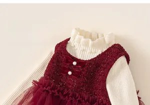 Detail of tweed dress with pearl bows and knit sweater featuring ruffled lace edges