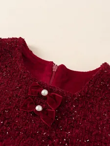 Sleeveless red tweed dress for girls with velvet bows and pearl details