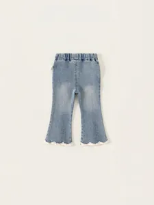 Jean évasé bleu clair pour filles avec taille élastique et bordure en dentelle