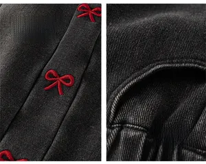 Detail of girls black denim pants with red bow embroidery and side functional pockets