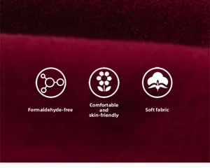 Détail du tissu en velours bordeaux doux montrant une texture de haute qualité