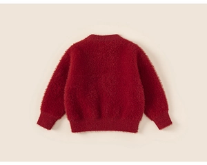 Detail of red plush knit sweater for girls with soft fuzzy texture and ribbed cuffs