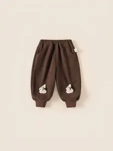 Pantalon en velours côtelé marron foncé pour filles avec patchs lapin et chevilles élastiques