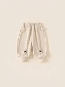 Pantalon en velours côtelé beige pour filles avec patch lapin et poignets élastiques