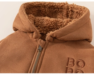 Detail of warm brown suede coat with fleece lining and BOBO embroidery for boys