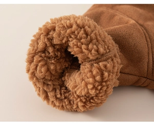 Close-up of caramel brown faux suede sleeve with thick warm faux shearling lining