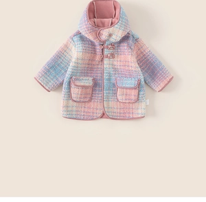 Detail of colorful plaid fleece hoodie for girls with large pockets and soft pink lining