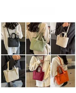 Molteplici viste di eleganti borse in pelle PU indossate a spalla e a tracolla in vari colori