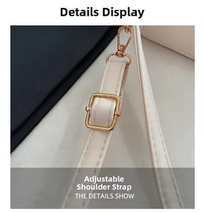 Detail of adjustable cream PU leather shoulder strap with golden metal hardware