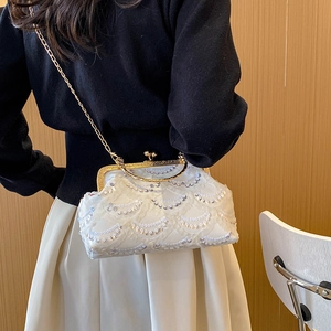 Lace evening handbag with golden circular handle and sequin fan patterns for women
