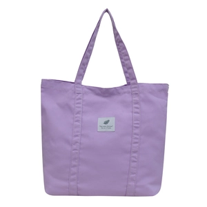 Minimalist purple canvas tote bag with dual handles and large capacity storage