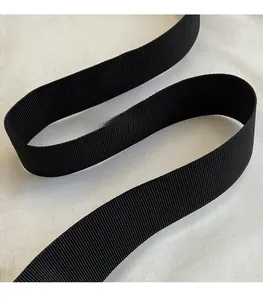 Detail view of the durable black woven shoulder strap with high density cross-hatch texture