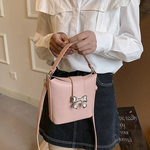 Fashionable PU Leather Bucket Bag For Women With Metal Bowknot Decoration Casual Commuting Shoulder Crossbody Handbag