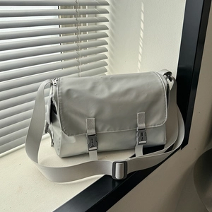 Minimalist light grey messenger bag with large capacity and adjustable shoulder strap